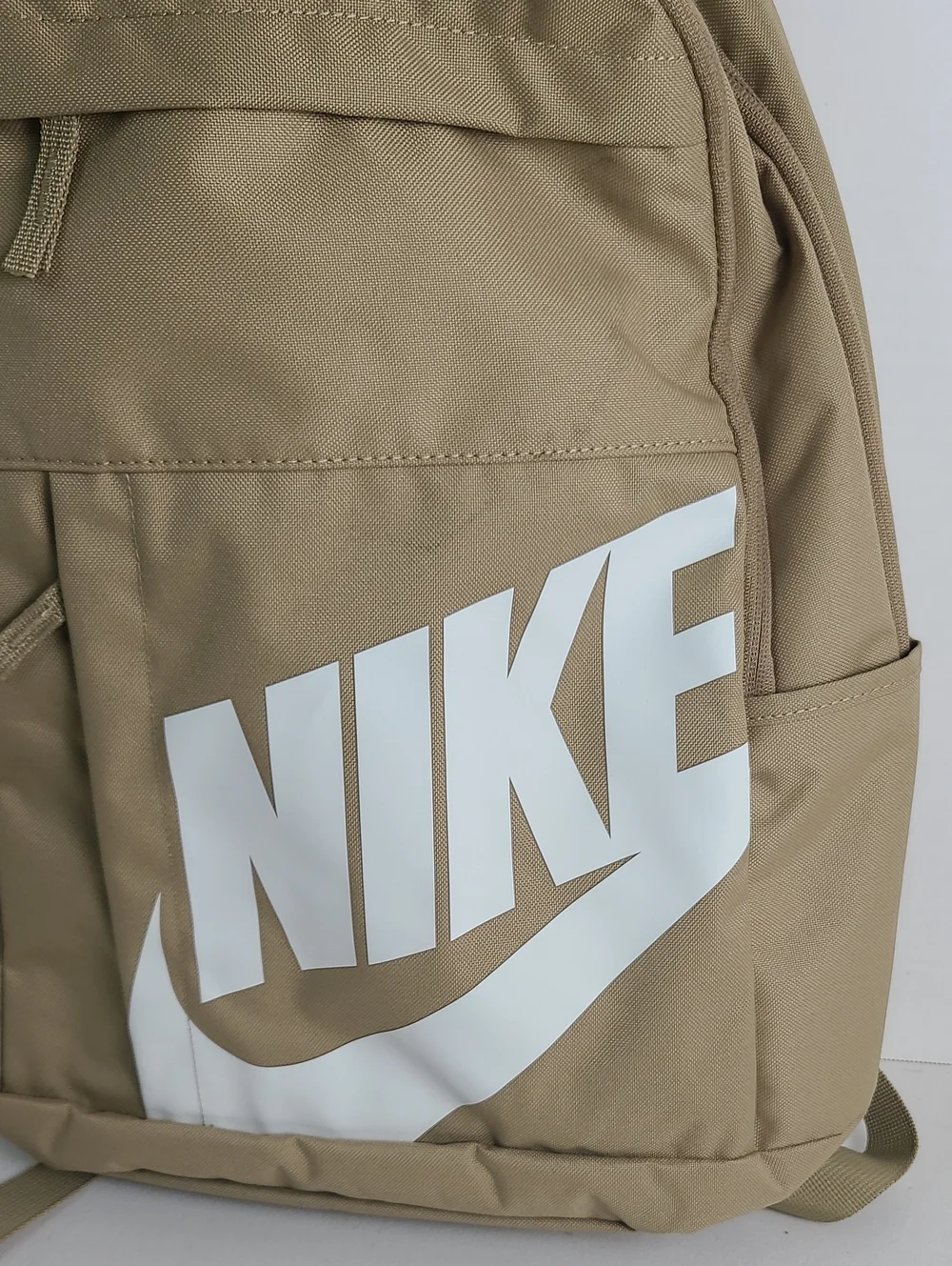 NWT NIKE Mulriple Zip Compartment Pockets Backpack Tan Beige with White Logo